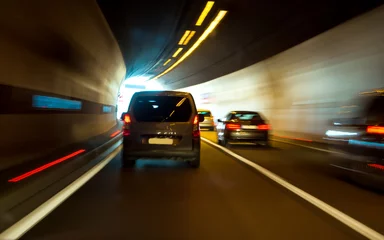 Foto op Plexiglas anti-reflex Tunnel Tunnel with lights and moving cars