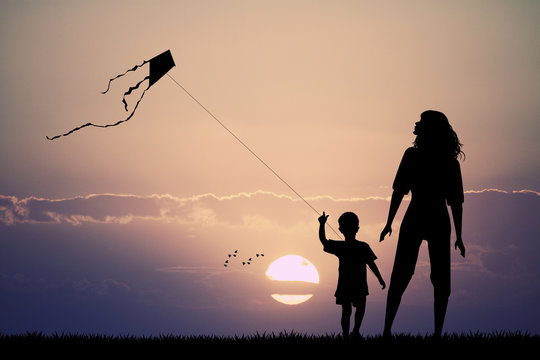 mother and son with kite