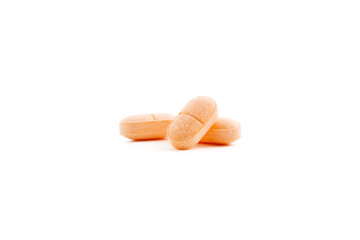 Obraz na płótnie Canvas Closeup Vitamin C Tablets Isolated on White Background.