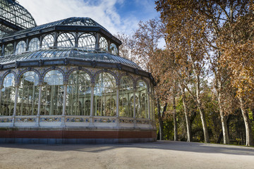 Fototapeta na wymiar Crystal Palace (Palacio de cristal) in Retiro Park,Madrid, Spain