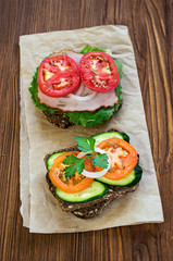 Sandwiches with ham, cheese and tomatoes