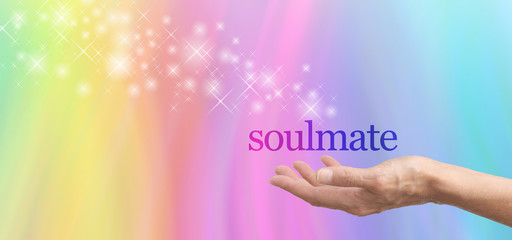 Seeking a Soulmate - female hand palm up with the word Soulmate floating above, surrounded by a...