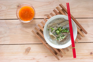 Pork stomach porridge with sauce