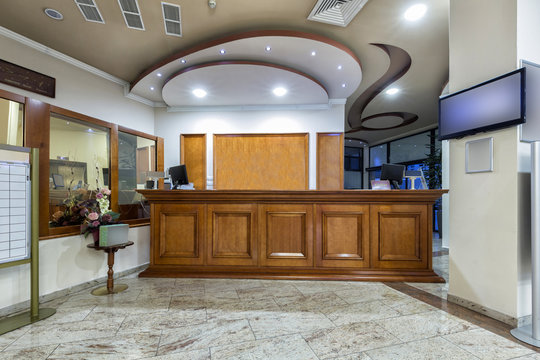 Wooden Reception Desk - Reception Area In Hotel
