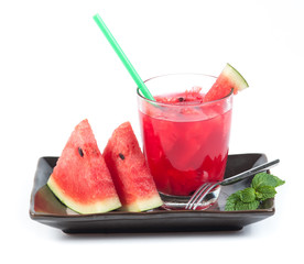 Watermelon juice in a glass on a white background