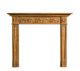 Antiqur pine fireplace surround with carving isolated on white t