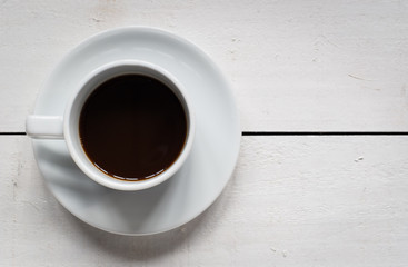 white cup coffee