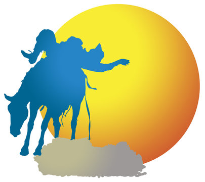 A silhouette of a bronc rider with sunset behind