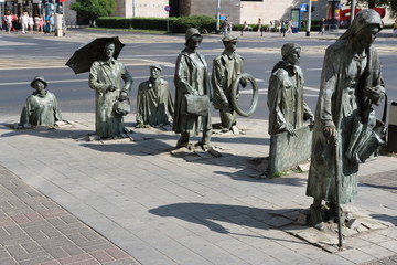 Detail of the monument of an anonymous passerby in Wroclaw (Poland).