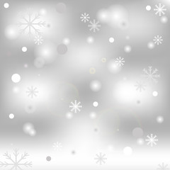Christmas background with snowflakes and bokhe