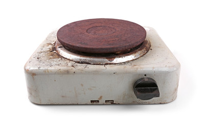 old dirty electric stove isolated on white