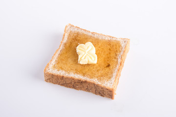 bread. bread with butter on a background