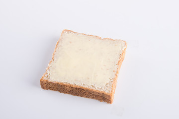 bread. bread with butter on a background