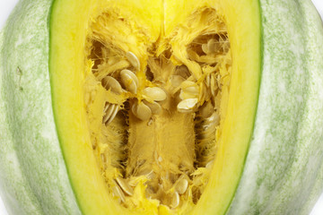 Close-up of sliced pumpkin isolated on white background