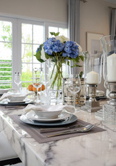 elegant table set in vintage style dining room interior