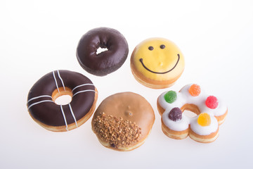 Assorted donuts donuts on a background