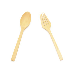 brown wooden spoons and fork on white background