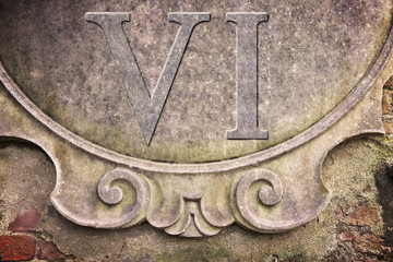 Roman number written on stucco wall - concept image