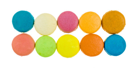 Colorful macarons on white background. Macaron or Macaroon is sw
