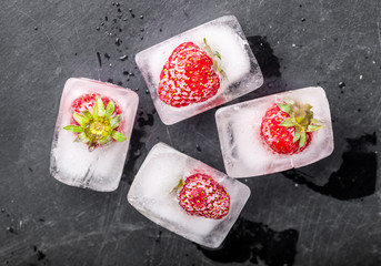 Ice cubes with strawberries