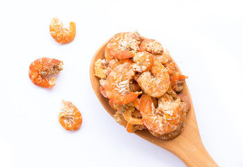 Fototapeta na wymiar Dried shrimp put on wooden spoon isolated on white background.