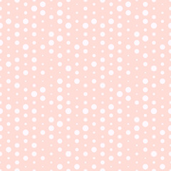 Cute pink and white dotted vector seamless pattern.