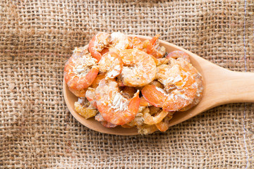 dried shrimp put on wooden spoon.