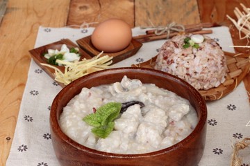 Brown rice porridge put pork and brown rice with soft-boiled egg