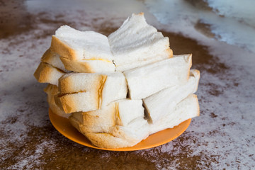 Traditional oriental steamed bread with butter and kaya at coffee shop