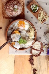 Brown rice porridge put pork and brown rice with soft-boiled egg