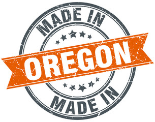 Oregon orange grunge ribbon stamp on white