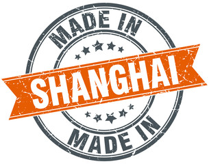 Shanghai orange grunge ribbon stamp on white
