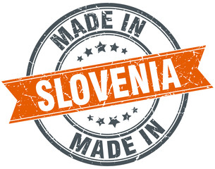 Slovenia orange grunge ribbon stamp on white