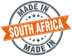 South Africa orange grunge ribbon stamp on white