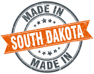 South Dakota orange grunge ribbon stamp on white