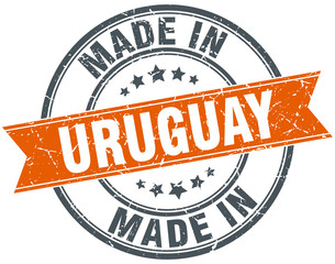 Uruguay orange grunge ribbon stamp on white