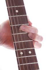 woman's hand and guitar chords