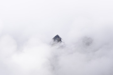 Cime tra le nuvole col maltempo - Alpi Pennine