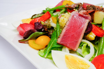 Tuna Nicoise Salad selective focus on tuna