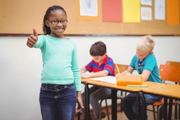 Smiling student with thumbs up