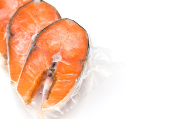 Frozen salmon fillets in a vacuum package
