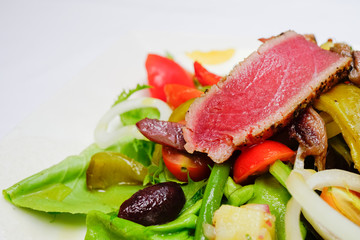 Tuna Nicoise Salad selective focus on tuna