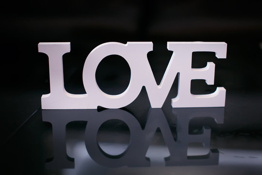 Love Shape On Black Mirror Background