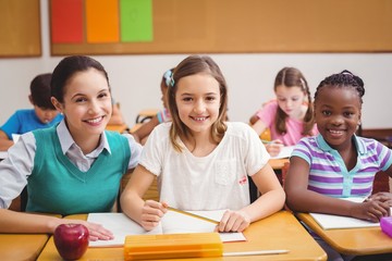 Teacher with pupils during class