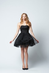 girl in dress studio shot