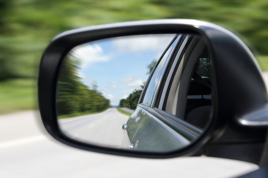 Image Of Street From The Sideview Mirror