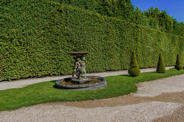 Beautiful Gardens of famous Versailles palace. Paris, France.
