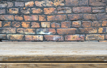 Empty shelf and vintage brick wall - background