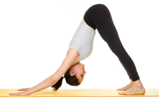young woman practising yoga exercises