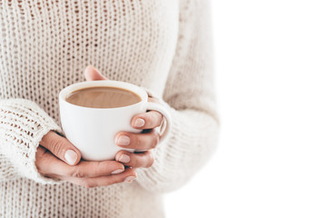 Warming cup of coffee in the hands of women isolated - obrazy, fototapety, plakaty